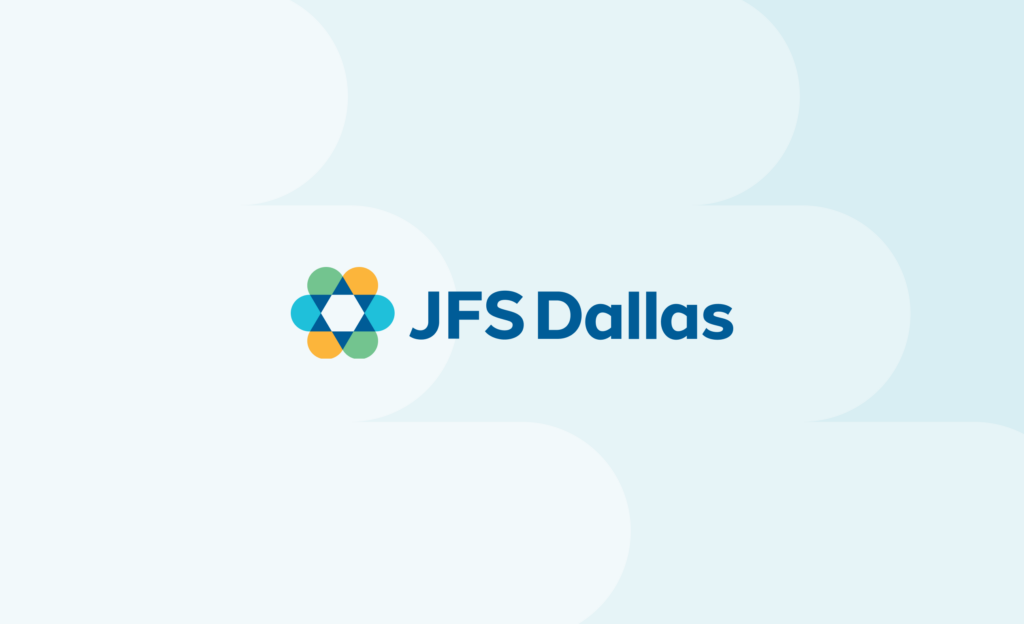JFS Dallas logo with overlapping blue, green, and orange shapes on a light blue abstract background.